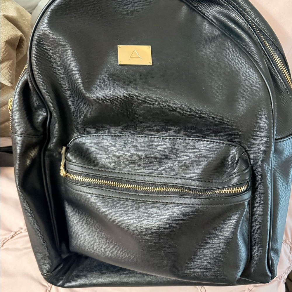 Aldo Black Backpack with Gold Details